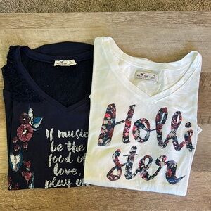 Lot of 2 Hollister shirts size XS Navy w/lace shirt & White shirt with lace.
